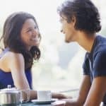 attracting women image of guy and girls talking